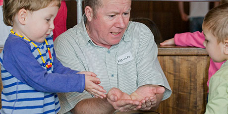 Kevin Graal with early years children