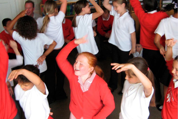 children dancing - part of a Kevin Graal storytelling in schools project